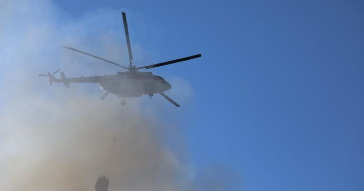 Алматыда қоймадан шыққан өртті тікұшақпен сөндірді