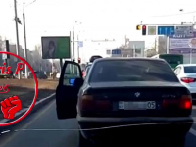 Алматыда жолға түкірген BMW жүргізушісі жазаланды