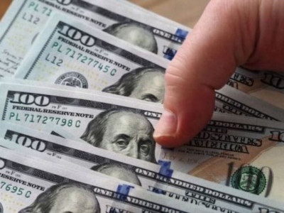 9 мыңнан аса долларды қолдан жасаған күдікті қамауға алынды