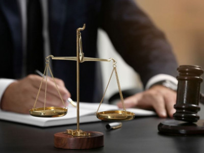 Ұлттық қауіпсіздік комитетінің операциясын бұзған банк қызметкері сотталды