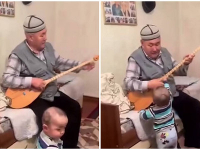 Атасы домбыра тартқанда билейтін 1 жасар бала елді тәнті етті (ВИДЕО)