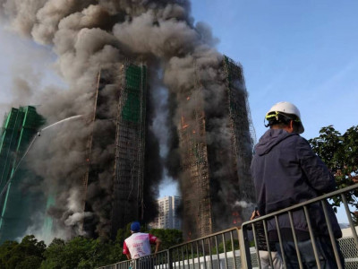 Гонконгтағы алапат өрт: Тұрғын үй кешенінде 36 адам қаза тапты