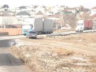 Шымкентте жауын салдарынан жаңа салынған жол опырылып түсті