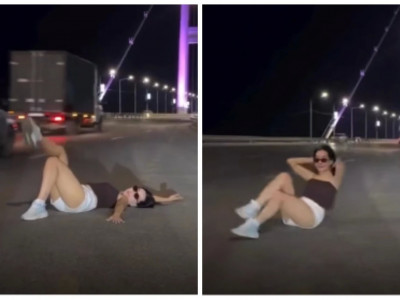 Семейде көпір үстінде жолға жатып фотоға түскен әйелге айыппұл салынды