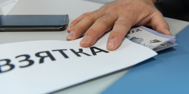 Полиция бөлiмiнiң басшысы парамен ұсталды