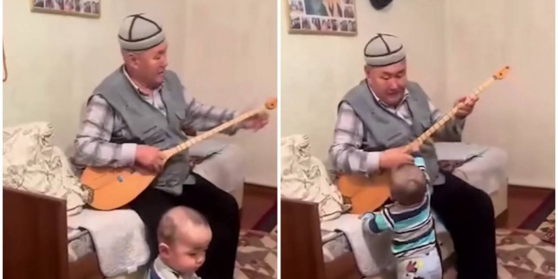Атасы домбыра тартқанда билейтін 1 жасар бала елді тәнті етті (ВИДЕО)