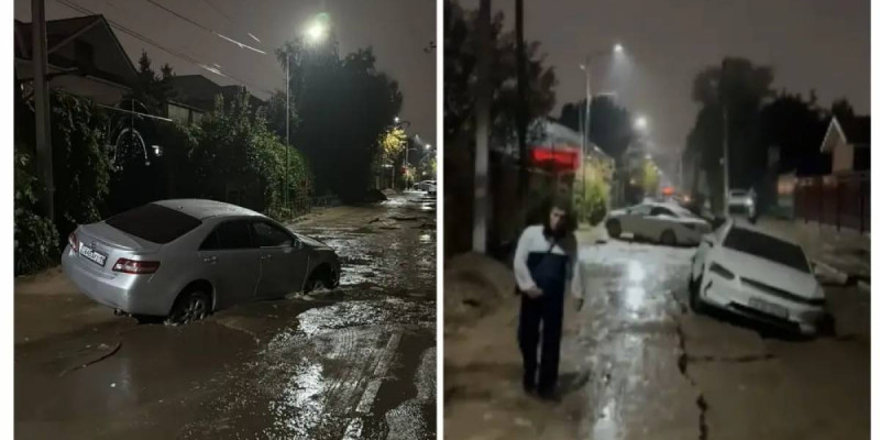 Алматыда жаңбырдан жол опырылып, 13 көлікке зақым келген